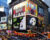 Corner of Times Square at 7th Avenue showing advertisement billboards for Broadway shows in Manhattan, New York City